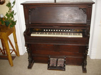 harmonium Dominion et piano mécanique ancien à vendre
