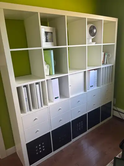This pre-loved IKEA Kallax shelving unit is the perfect organization solution, featuring a clean whi...