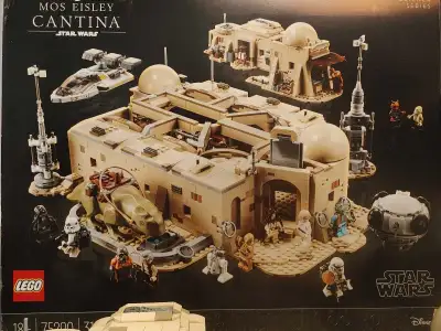 I'm selling my Star Wars Lego Mos Eisley Cantina, set number 75290, which includes 3187 pieces, seve...