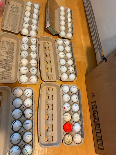 Golf balls recycled & new golf balls + more golf items, View more