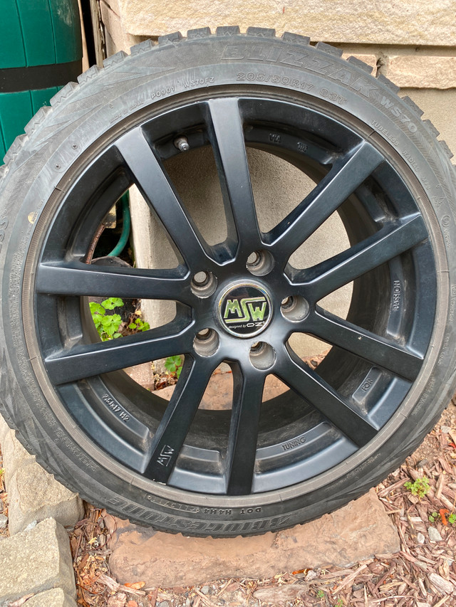 Set of BMW snow tires with Black wheels for sale in Tires & Rims in St. Catharines