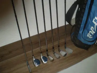 NORTHWESTERN ( MEN's L/H ) GOLF CLUBS and BAG $80., View more