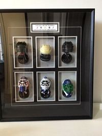 Miniature Hockey helmets (McDonald’s 2009) in a shadow box