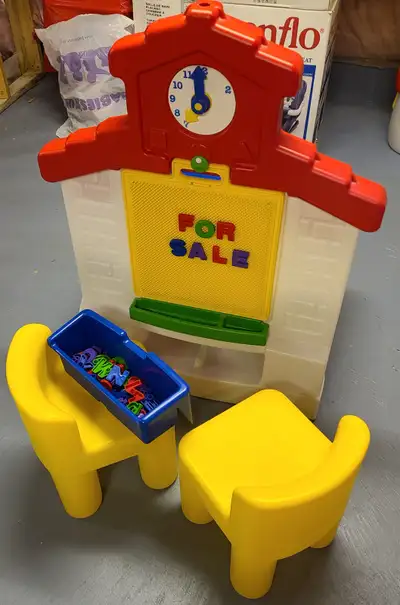 Toy table with numbers and letters for kids' learning. A storage compartment under the table top. Co...