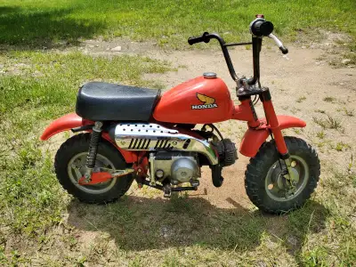 Completely original except for brand new replica muffler and kickstart. No mods. Stored and unused f...