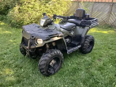 2015 Polaris Sportsman X2 570 EPS. Has power steering, factory installed hand/thumb warmers and a wi...