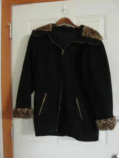 ladies winter coat size small/med has a hood & zipper pockets no longer fits me pick up Havelock