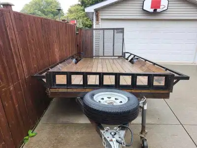 Custom 6x14 Utility Heavy Duty trailer! 1 owner, had it made! Heavy duty ramps Back and side load Br...