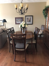 Solid oak dinning table and 8  Hooker chairs