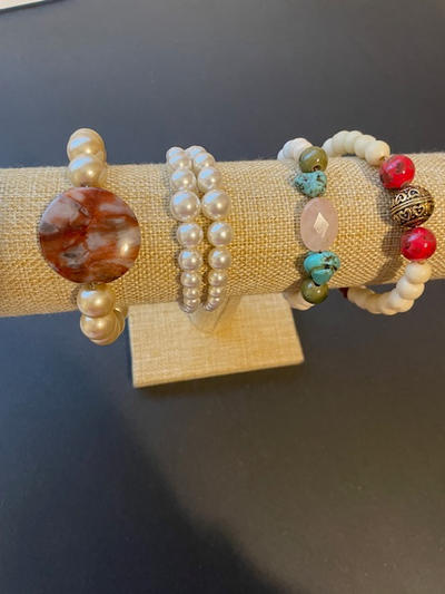 Four Costume Jewelry Bracelets, View more