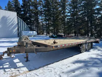 High deck trailer, 20’ length. 7k pound axles, tires are in decent shape. No ramps.