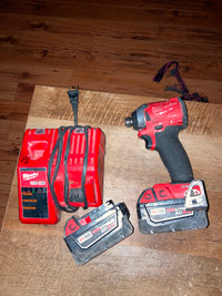 Milwaukee impact plus charger and two batteries