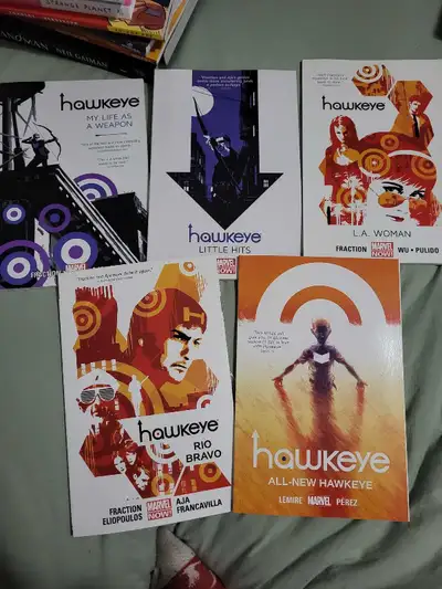 Selling a Marvel comic bundle which includes Hawkeye, Ms Marvel, Deadpool, and Daredevil comics in v...