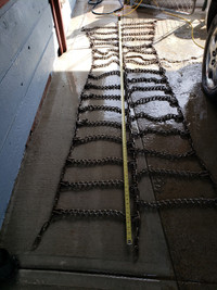 Studded chains triples for 11.00x24.5 semi truck tires.