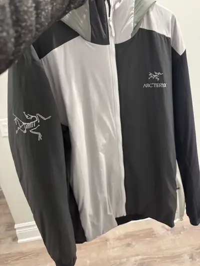 Men's Arc'teryx jacket in size XL. This jacket is black and light grey. Collab with beams $750