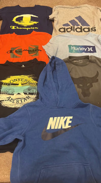 Lot of 7 boy’s brand name shirts /hoodie sizes medium and large 