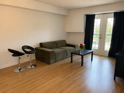 Welcome to this bright and beautifully maintained one-bedroom condo featuring a functional open-conc...