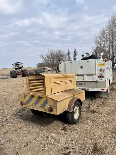 Starts and runs good Compressor is strong 4 cylinder Wabco gas engine Older unit but never skips a b...