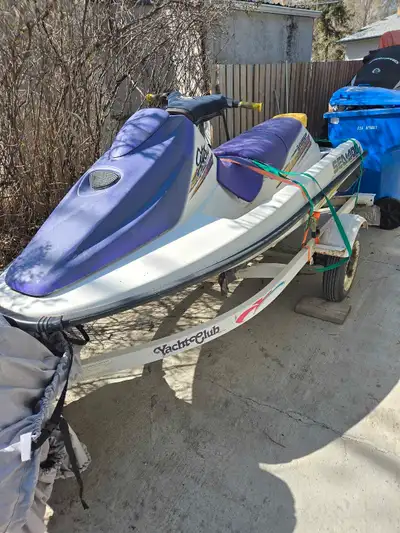 GTS for sale. 3 person with reverse. New starter and tuned up Yacht Club trailer. $2400 obo