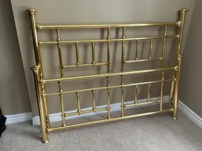 Solid brass bed including headboard, footboard & frame. Headboard is in excellent condition cosmetic...