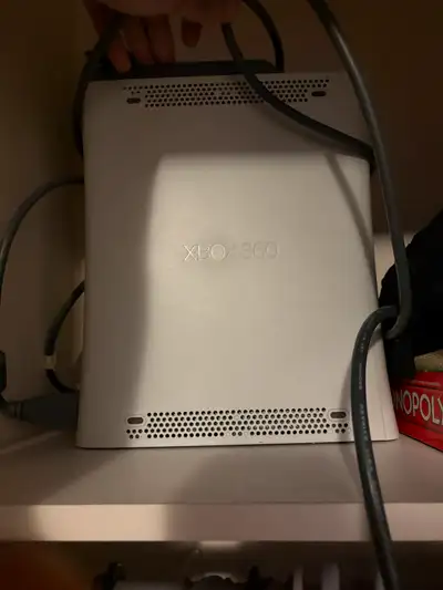 Xbox 360 with 20-25 games, View more