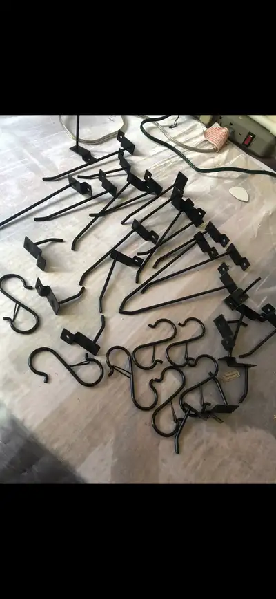 Assorted Black Metal Hooks and Pegboard Fixtures, View more