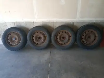 Set of 4 Firestone Winterforce 235/65R17 winter tires on 5x114.3 (5x4.5) steel rims. Rims are a bit...
