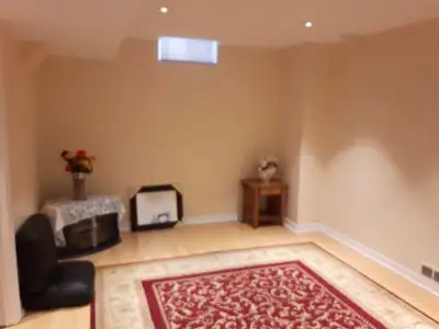 One big bedroom and a living room nicely built basement Apartment with seperate entrance from garage...