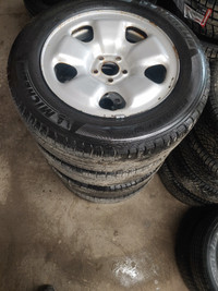 OEM jeep Cherokee steel rims w/ tires