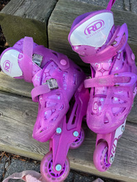 Excellent condition kids roller blades and safety equipment 