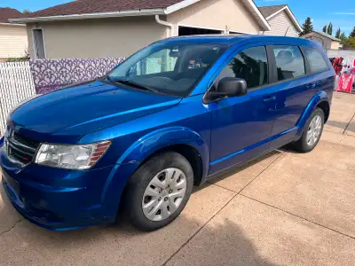 Reliable & Family-Friendly One-owner SUV in striking Blue Streak Pearl, only about 80,000 km. Powere...