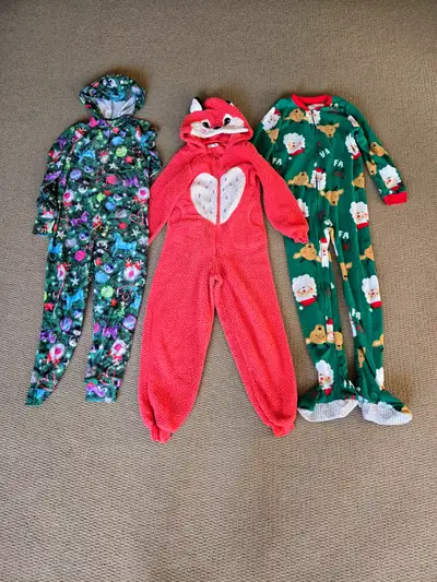 from left to right: - Justice size 10 Christmas onesie - Urban Kids size 10/12 Fox costume/onesie -...