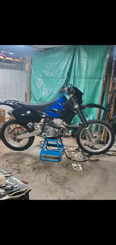 14000km but complete motor job. Done by a professional. About 500km on new motor. Works excellent