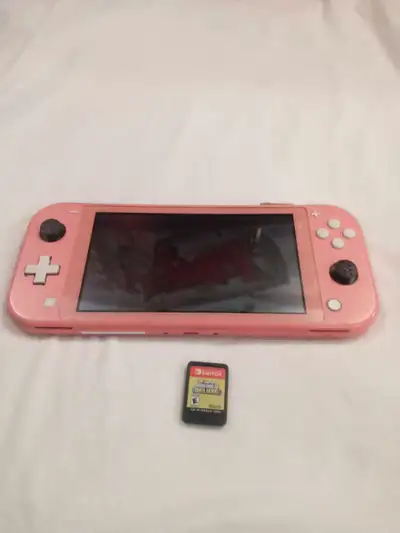 Switch lite with Mario Bros u deluxe price is firm Get it while the price that low I'll be changing...