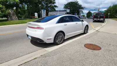 2014 Lincoln MKZ in great condition. 300 HP engine, 3.7 L AWD. New tires and new brakes. Glass panor...