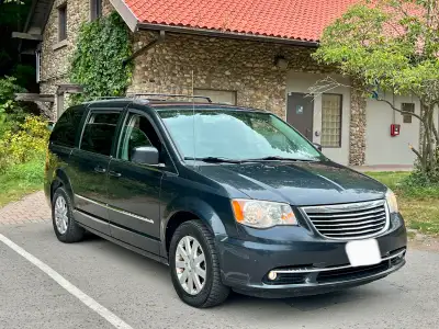 Selling my beautiful 2014 Chrysler town&country touring VEHICLE BEING SOLD CERTIFIED) It runs and dr...