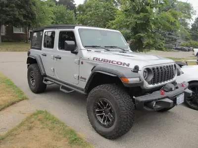 Rock sliders came off a 4 door 2024 Rubicon to allow side steps to be installed. They are in like ne...