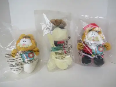 1990's McDonalds Christmas Garfield Stuffed Toys MIB, View more