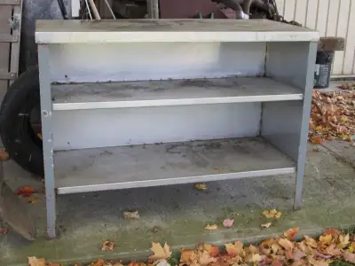 STAINLESS STEEL BENCH. Mild steel frame with stainless top & shelves. 45in X 20in X 33in high. $60.0...