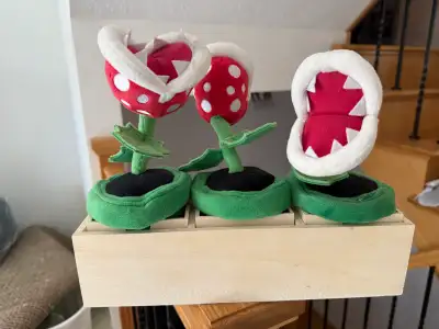 3 plush Pirhana Plants, posable. I can sell them with the wooden box they are currently housed in if...