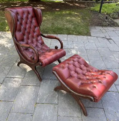 Vintage tufted leather lounge chair with matching ottoman, View more