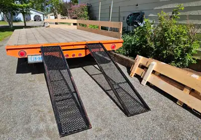 Located at Eva Lake, east of Atikokan. Selling a very nice 8'X16' heavy duty flat deck trailer with...