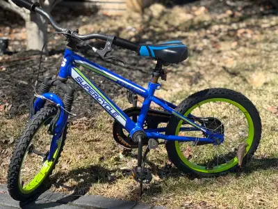 This Supercycle bike is equipped with 16-inch wheels, perfect for young riders ready to hit the pave...