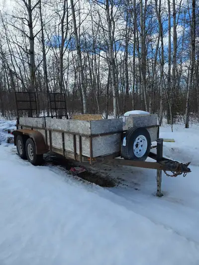 6x12 Home made trailer. Tandem axle 3500lb each. Drop end ramp. Good tires. Electric brakes. 2 inch...