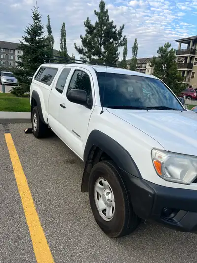 Toyota tacoma 2014 2.7 engine 4cyl cheap on gas 4WD drive high plus low Active status No accidents G...