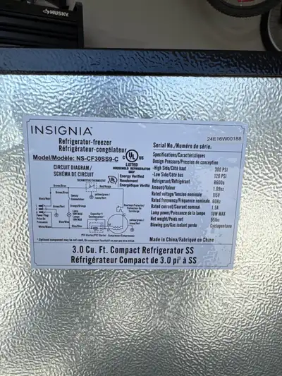 This is an Insignia 3.0 cu. ft. compact refrigerator-freezer, perfect for keeping your beverages and...