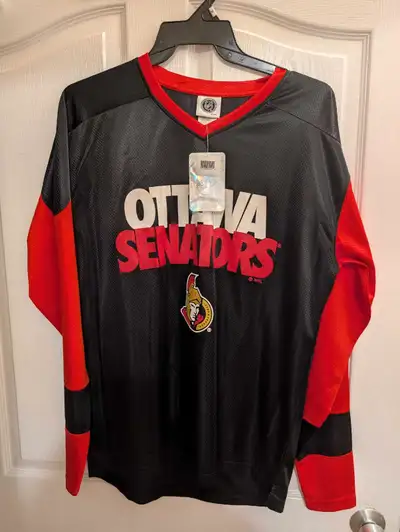 Show your team pride with this new Ottawa Senators NHL licensed jersey, perfect for game days or cas...