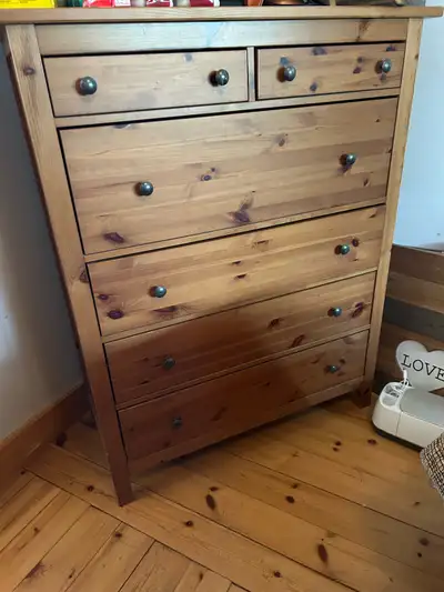 This is a solid wood dresser with a classic design and ample storage, featuring six drawers and a wa...
