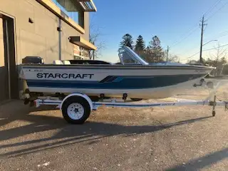 1995 Starcraft SFM 170 17foot Aluminum Fishing Boat 3 seats plus extra fold down bench in the back ,...