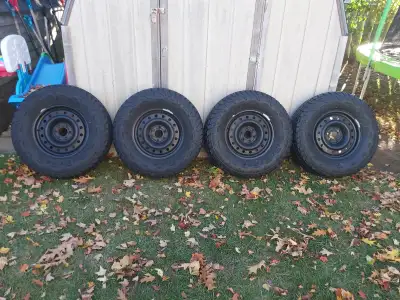 I have for sale, four, like new, "Certified", RidgeTrek all terrain tires mounted and balanced on fo...